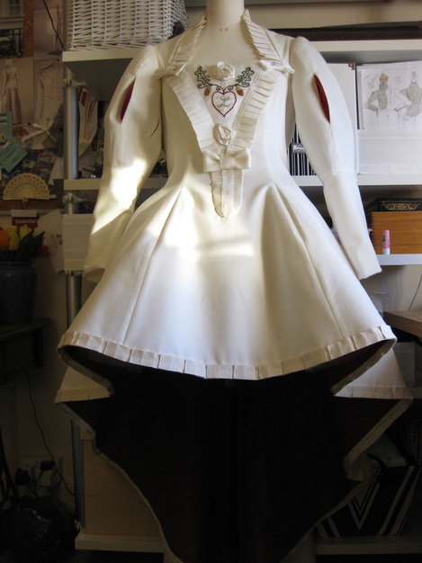 Atelier Redolent dress: view showing hemline shape - short at front, long at the back